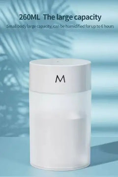 260ml white ultrasonic humidifier with ‘M’ logo on a light blue background